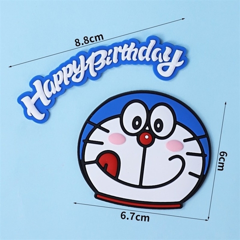 Que kute nhựa dẻo HPBD mặt DOREMON