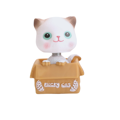 Trang trí mèo ngồi giỏ mở mắt