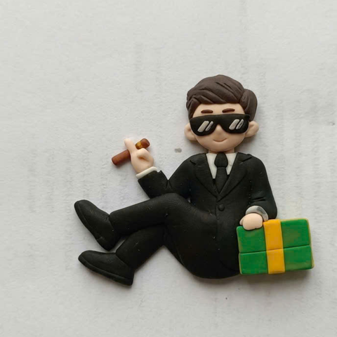 Que Kute 2D boss ngồi hộp quà xanh