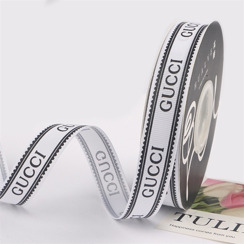 RB GUCCI màu TRẮNG CHỮ ĐEN 2CM*40m