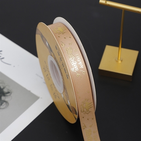 RB HPBD chữ nhũ VÀNG nền VÀNG ĐỒNG 2.5cm*50m