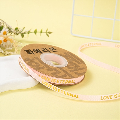 Rb LOVE IS ETERNAL khổ nhỏ 1cm*30m MÀU HỒNG chữ nhũ vàng