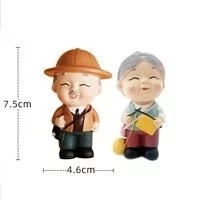 Tượng ông bà đan len mũ cối