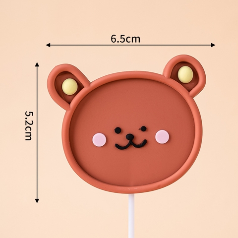 Que kute nhựa mặt gấu nâu