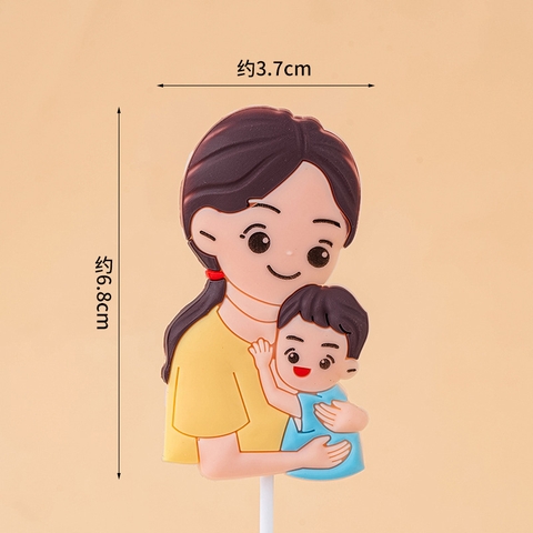 Kute slc mẹ áo vàng bế con trai