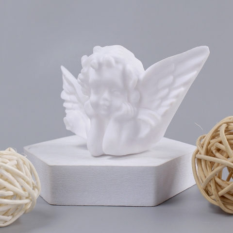 Trang trí thần cupid nhựa trắng