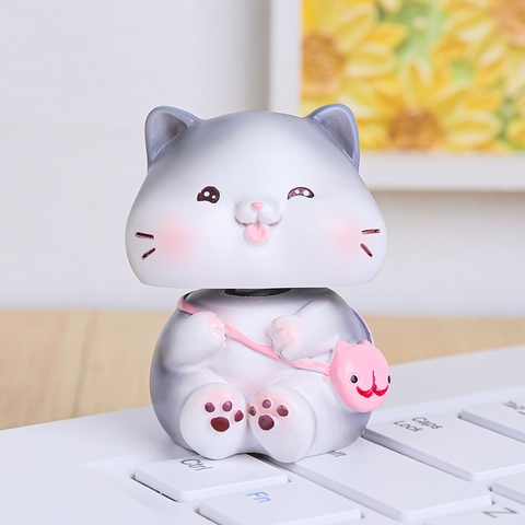 Trang trí MÈO XÁM đeo túi hồng SỨ ( CỔ LÒ XO)-5cm