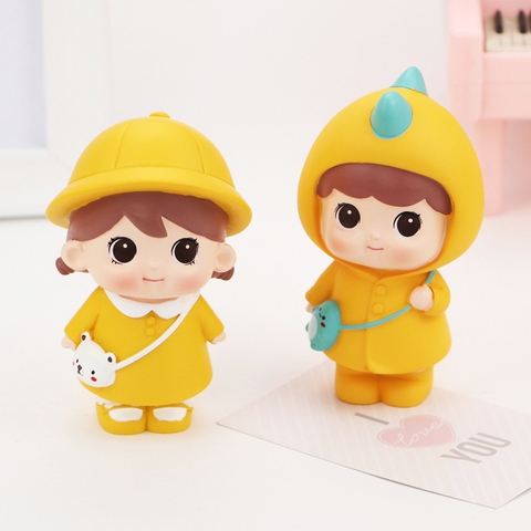 Đồ chơi trang trí bé trai-gái áo vàng-NHỰA--SALE