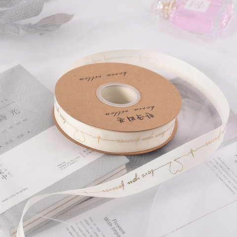 Rb Love you forever vàng ngà(2.5cm*45m)