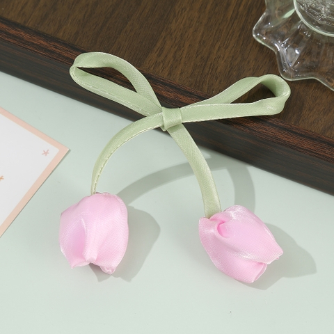 Dây hoa tuylip vải làm nơ màu hồng