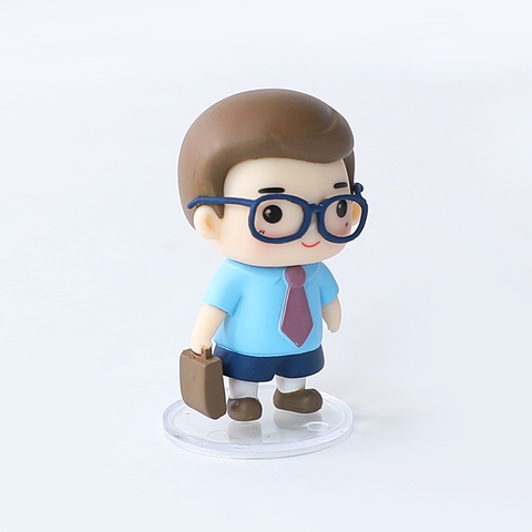 Trang trí bé trai áo xanh xách cặp áo xanh