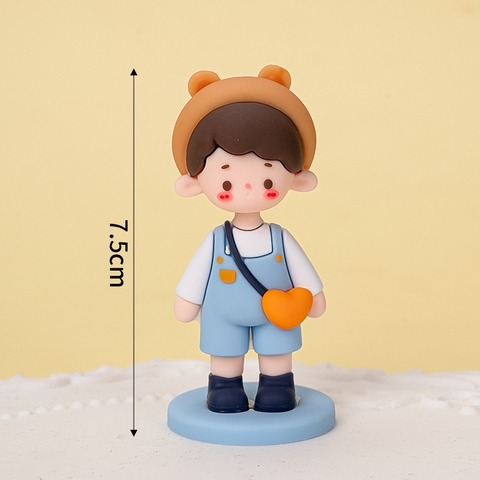 Bé trai yếm xanh mũ gấu túi cam