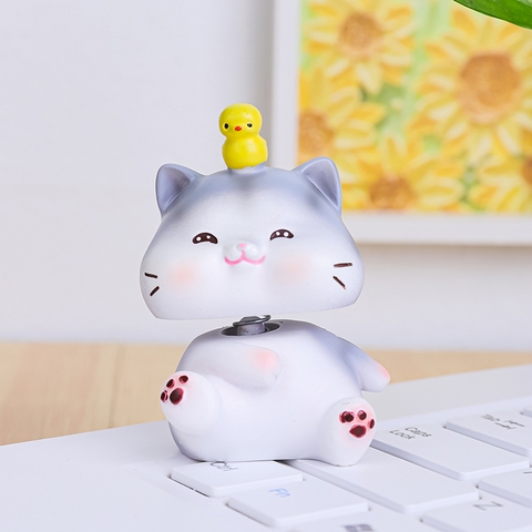 Trang trí MÈO XÁM đội vịt SỨ ( CỔ LÒ XO)-6.2cm