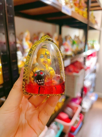 Amulet Kuman to ôm đầu lâu