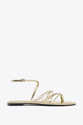 GOLD STRAPPY FLAT SANDALS