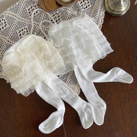 Quần tất 2in1 kèm váy 3 màu đen, trắng, be