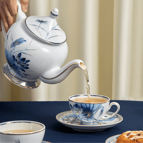 Bộ trà sứ Minh Long 1.3 L - Hoàng Cung - Sen Vàng