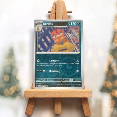 Thẻ hình Pokemon Scrafty 061/091 - Lá bài lẻ Paldean Fates Uncommon Reverse Holo tiếng Anh chính hãng