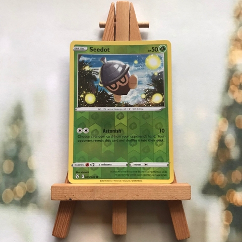 Thẻ hình Pokemon Seedot 005/203 - Lá bài Sword & Shield: Evolving Skies Common Reverse Holo tiếng Anh chính hãng