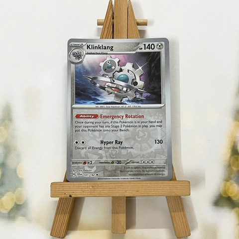 Thẻ hình Pokemon Klinklang 101/142 - Lá bài lẻ Stellar Crown Rare Reverse Holo tiếng Anh chính hãng