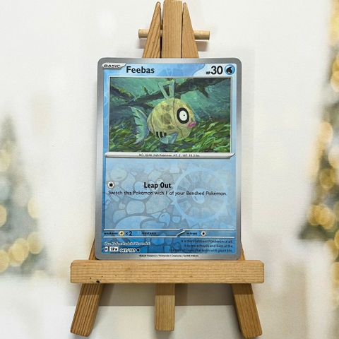 Thẻ hình Pokemon Feebas 041/191 - Lá bài lẻ Surging Sparks Common Reverse Holo tiếng Anh chính hãng