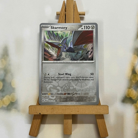 Thẻ hình Pokemon Skarmory 124/191 - Lá bài lẻ Surging Sparks Common Reverse Holo tiếng Anh chính hãng
