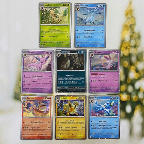 Thẻ hình Pokemon Eevee Evolves Cosmos Holo Promo từ hộp 8-tin Exclusive Prismatic Evolution chính hãng