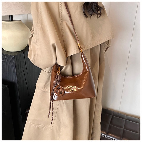 Túi xách cầm tay hình bánh bao