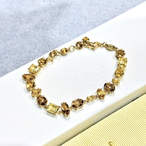 SWAROVSKI Gema bracelet (Mixed cuts, Yellow, Gold-tone plated) - Vòng, lắc tay, đính mix pha lê, tone vàng-nâu - JEWELRY BRACELET
