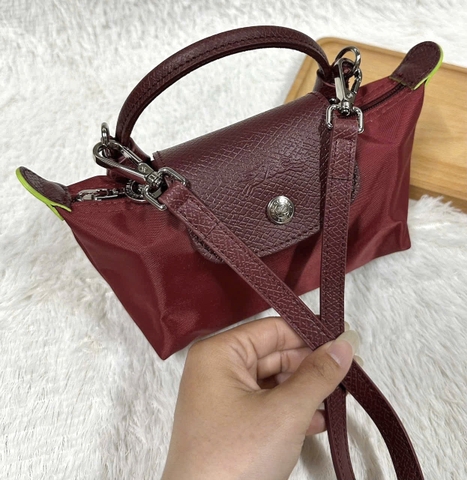 CHÍNH HÃNG - MINI SIZE - TÚI LONGCHAMP LE PLIAGE GREEN POUCH WITH HANDLE - GRENADE - Túi xách màu đỏ lựu