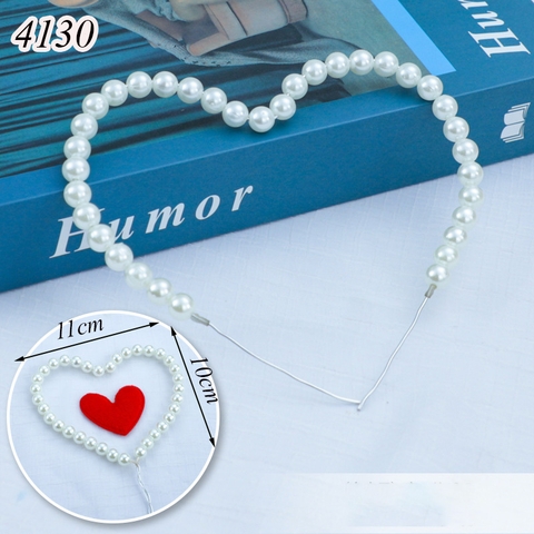 QC-que cắm tim ngọc trai