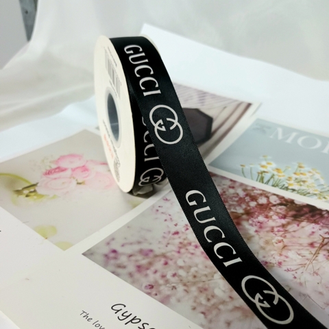 Ruybang băng Gucci đen khổ 2.5cm dài 50m.
