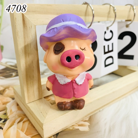 Tượng heo mũ tím