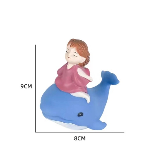 Tuong - bé gái cưỡi cá voi xanh