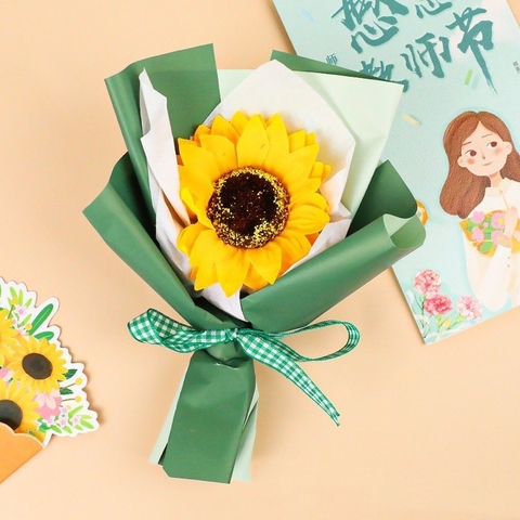 Bó hoa sáp hướng dương vàng bọc xanh