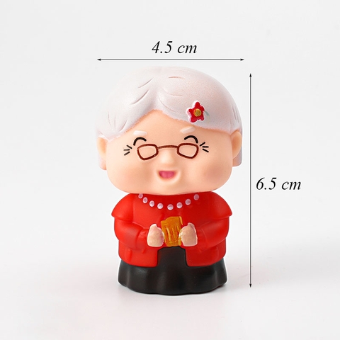 CN-cụ bà đỏ cầm khăn nhựa mềm