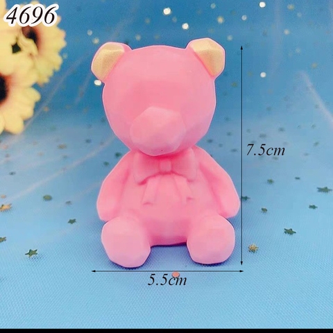 Tượng gấu đeo nơ hồng nhựa mềm