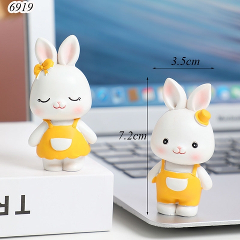 CV-Cặp Thỏ Trắng Áo Cam Nhựa Dẻo