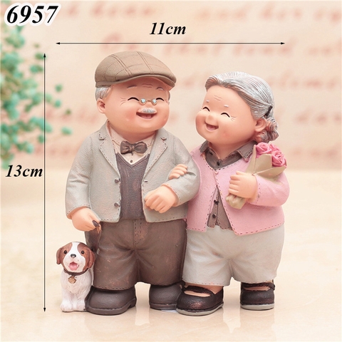 Tượng Ông Bà Cầm Hoa Sứ