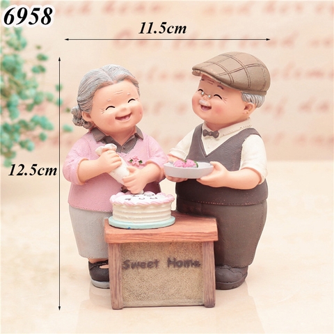 Tượng Ông Bà Làm Bánh Sứ