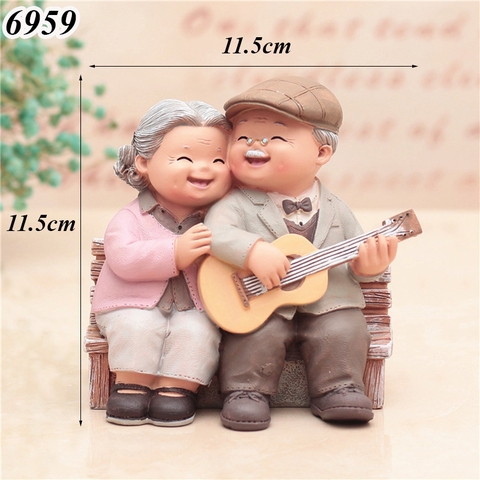 Tượng Ông Bà Đánh Đàn Sứ