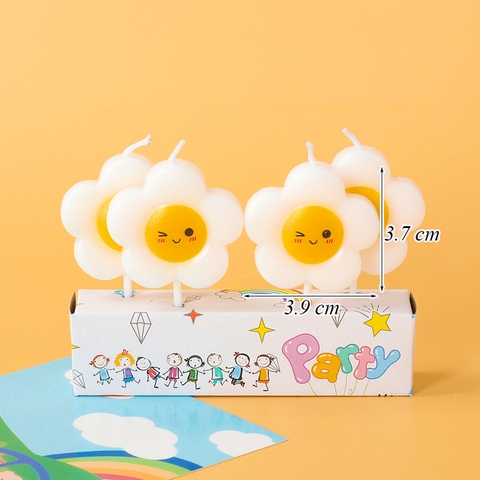 Vỉ 4 nến hoa trắng mặt cười TQ