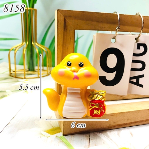 Rắn vàng hũ tiền TT