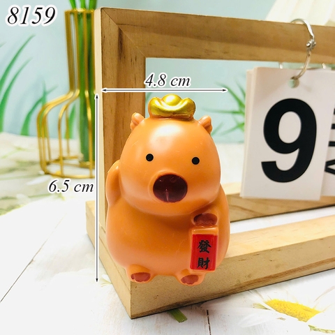 Capybara thần tài cầm chữ TT