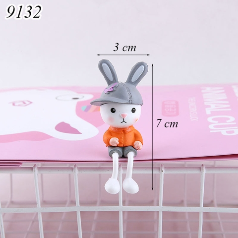 Tượng bé thỏ áo cam