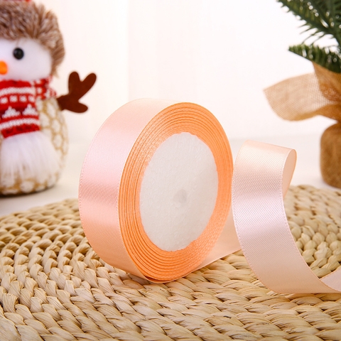 Ruybang lụa trơn cam hồng khổ 2cm,22m