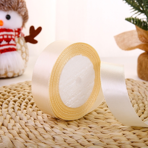 Ruybang lụa trơn be sữa khổ 2cm,22m.