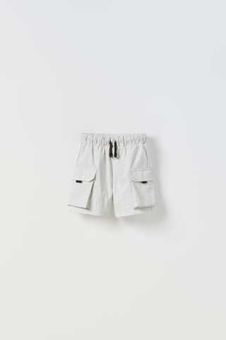 Quần shorts xám nhạt / túi hộp