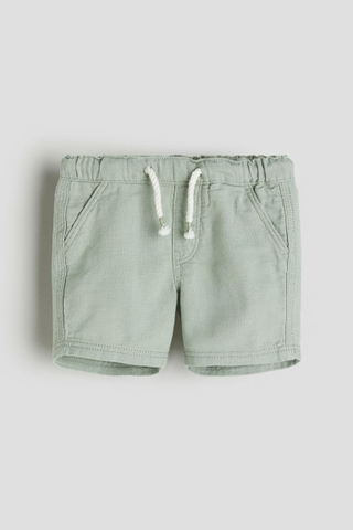 Quần shorts xanh lá nhạt / dây trắng