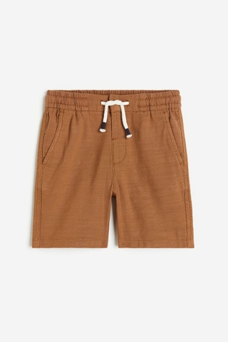 Quần shorts nâu / dây trắng 2024